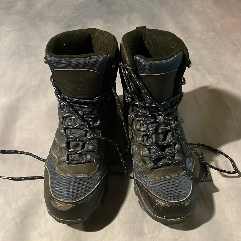 Men’s winter boots, blue, and black caribou